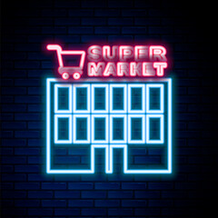 Glowing neon line Supermarket building with shopping cart icon isolated on brick wall background. Shop or store. Mall building. Colorful outline concept. Vector