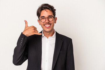 Young mixed race business man isolated on white background showing a mobile phone call gesture with fingers.