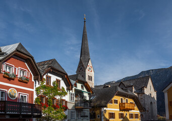 Obraz premium Hallstatt colorful buildings and Evangelical Church tower - Hallstatt, Austria