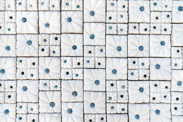 background of tiles, square tiles with blue dots. an interesting unusual background with a Turkish pattern