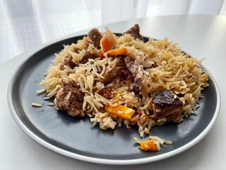 pilaf with meat in a plate