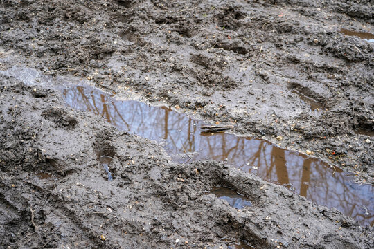 Flooded muddy soil in the country