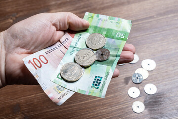 Norwegian forints in the hand