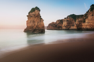 Praia Dona Ana Beach and Rock formations at sunrise - Long Exposure shot - Lagos, Algarve, Portugal