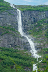 Obraz premium Ice melting in the spring and makes a big waterfall.
