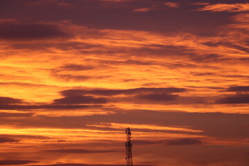 telecomunication tower in the sunset