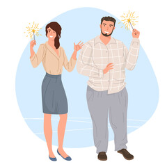 man and woman with sparklers in hand