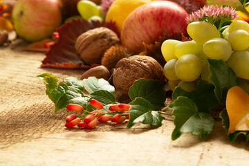 Autumn harvest, fruits and vegetables on a wooden background. Thanksgiving or harvest holiday concept.