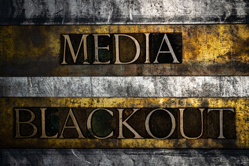 Media Blackout text on vintage textured grunge copper and gold background