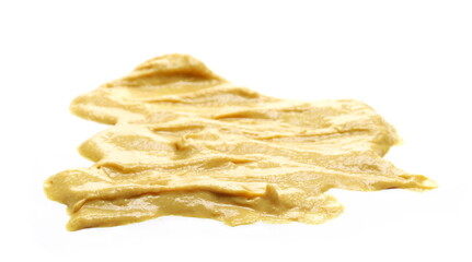 Yellow mustard sauce, spread isolated on white background, side view