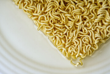 Closeup instant noodles on a plate.