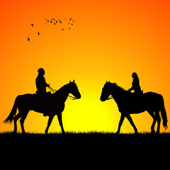 Silhouette of two riders on sunrise