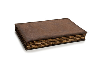 An old brown book isolated on white background.