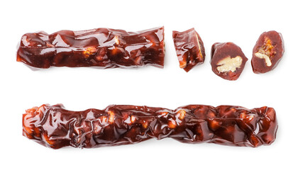 Churchkhela whole and pieces on a white background, isolated. Top view