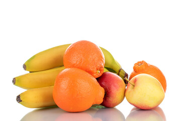 Three ripe bright orange minneola, two apples and a bunch of bananas, close-up isolated on white.