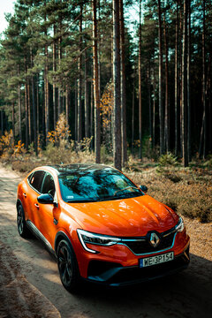 Riga, Latvia - 01.10.2021: Renault Arkana RS-line is a compact crossover SUV E-tech hybrid car. French automobile manufacturer.