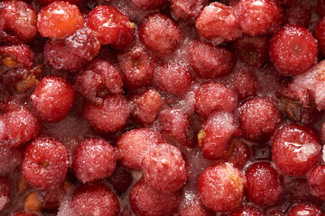 Sweet cherries jam, making homemade sweets with sugar