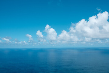ocean, blue sky and clouds