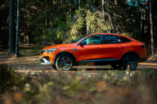 Riga, Latvia - 01.10.2021: Renault Arkana RS-line is a compact crossover SUV E-tech hybrid car. French automobile manufacturer.