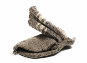 Traditional knitted woolen socks isolated on white background