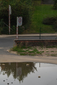 A 30 kmh speed limit zone sign on a bad road in Germany