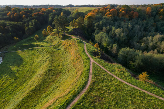 Top of the baltic mound with beautiful colors of autumn photographed with a drone on sunny day. Regional park of neris in Lithuania. Dukstai educational trail. Real is beautiful  