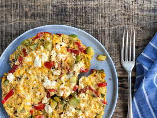 Homemade veggie and cheese omelet on the table for breakfast