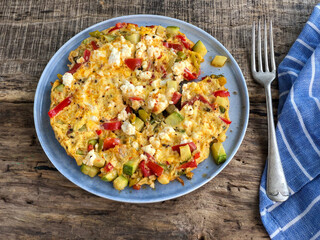 Homemade veggie and cheese omelet on the table for breakfast