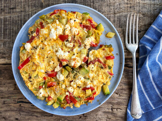 Homemade veggie and cheese omelet on the table for breakfast