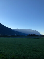 Fototapeta premium SCHAAN, LIECHTENSTEIN, SEPTEMBER 24, 2021 Morning mood in the alps