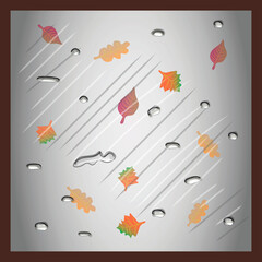 Rain drops and autumn leaves behind the window glass