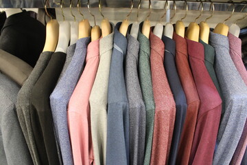 Men's jackets in different colors on sale rack