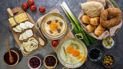 Flat-lay of Organic, and fresh delicious traditional Turkish breakfast on table.with empty space.