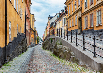 Picturesque street with cobbles and colorful buildings in Stockholm city. - 460695187