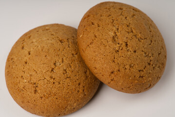 Two cookies on a white background closeup