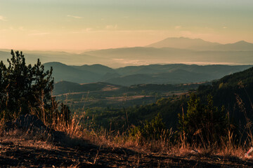 sunrise in the horizon, over Bulgarian hills.