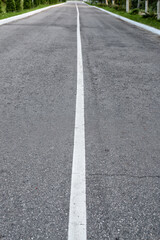 An empty road with a dividing strip