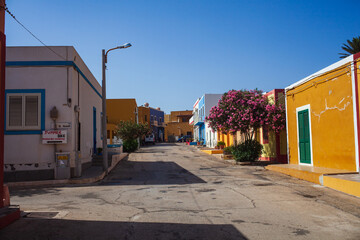 View of a typical street of Linosa with colorful house