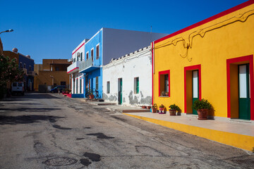 View of a typical street of Linosa with colorful house