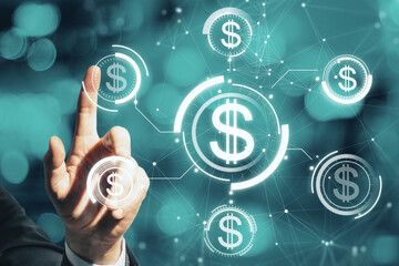 Close up of businessman hand pointing at glowing digital american dollar interface hologram on blurry bokeh background. Online banking, trade, business and investment concept.