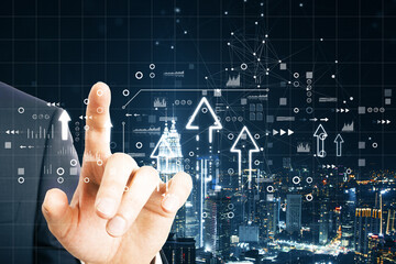 Close up of businessman hand pointing at abstract business interface with upward arrow on blurry night city background. Finance, technology and network concept. Double exposure.