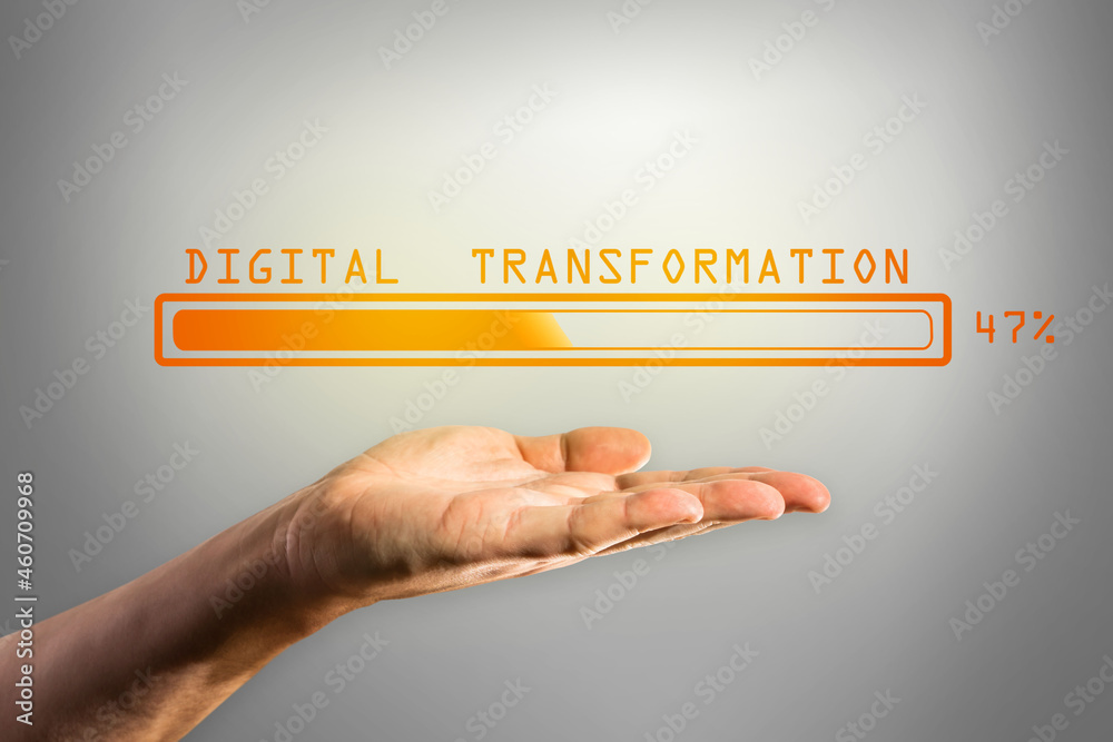 Poster Man hand holding abstract glowing loading bar on gray wall background. Digital transformation, internet, progress and technology concept.