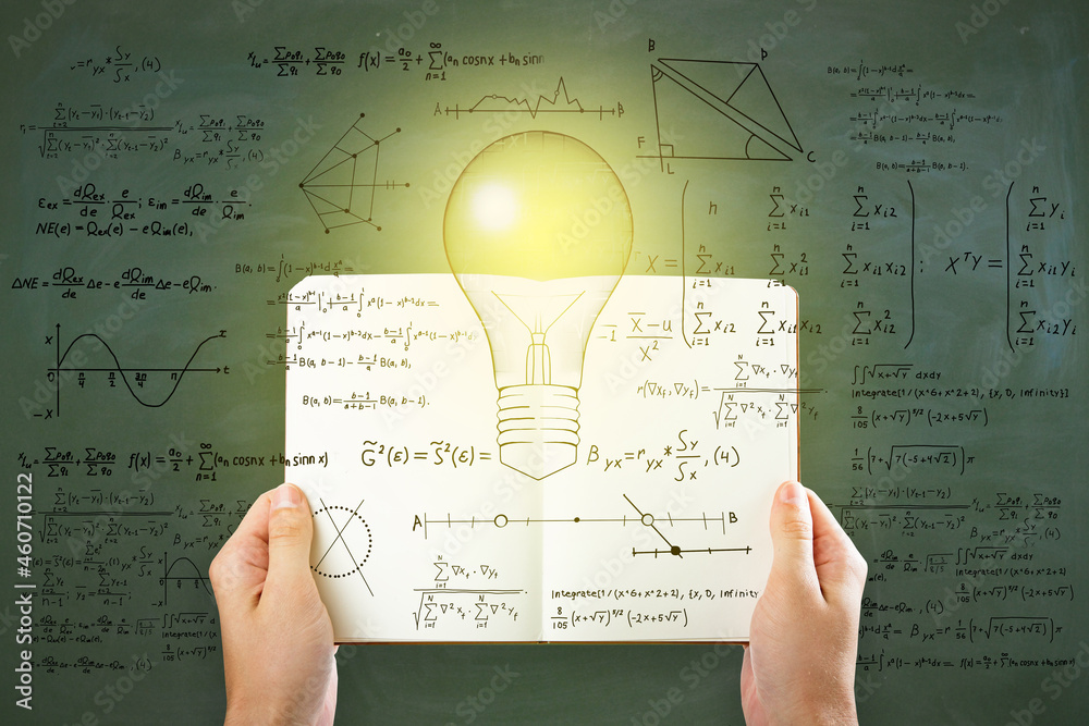 Aufkleber Hand holding open book with abstract light bulb sketch with mathematical formulas on chalkboard/blackboard wall background. Intelligence, idea, solution, science and innovation concept.