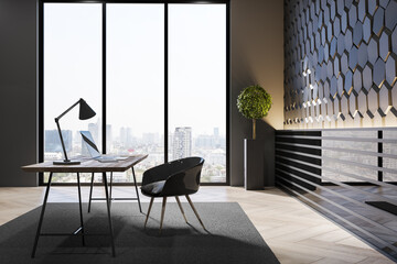 Contemporary workplace interior with window and city view, desktop, concrete hexagonal walls and decorative items. 3D Rendering.