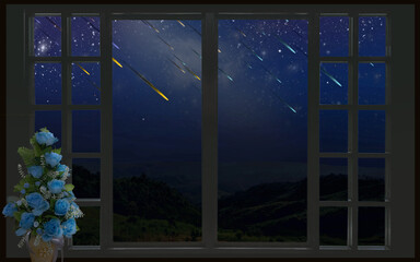 Beautiful meteor showers over the valley in window view