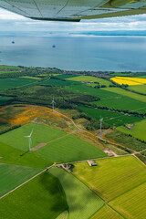 view of fields and wind turbines