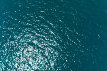 Sea surface aerial view,Bird eye view photo of blue waves and water surface texture Blue sea background Beautiful nature Amazing nature sea