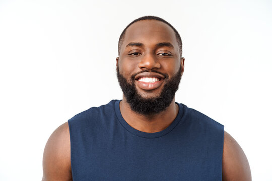 Young Fitness African Black Man In Sport Wear Cheering Carefree Isolated Over White Background.