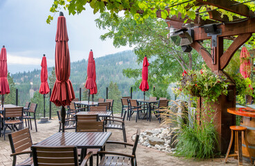 folded red umbrellas at beautiful restaurant setting