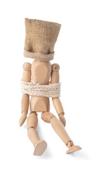 Mannequin with sack on head and rope tied around body on white background. Concept of hostage